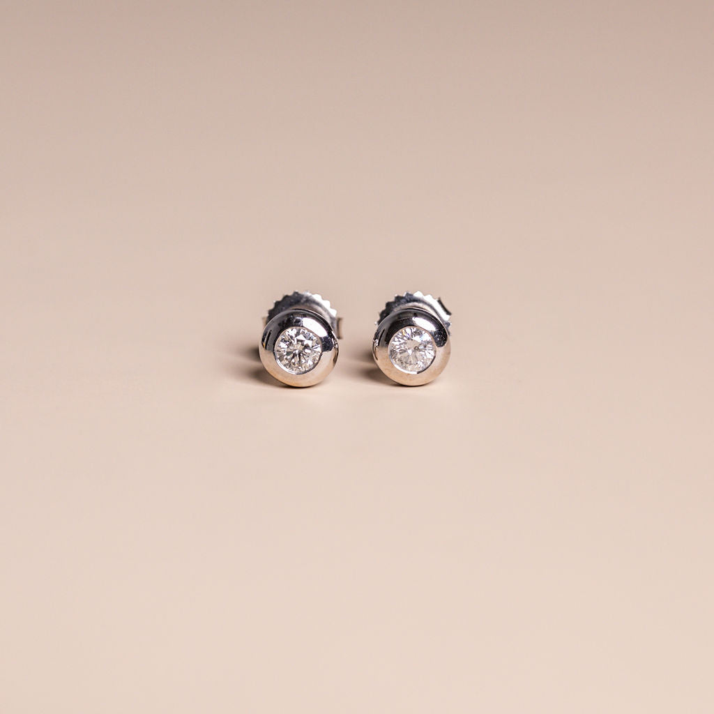 14k white gold chunky bezel set round diamond stud earrings modern vintage