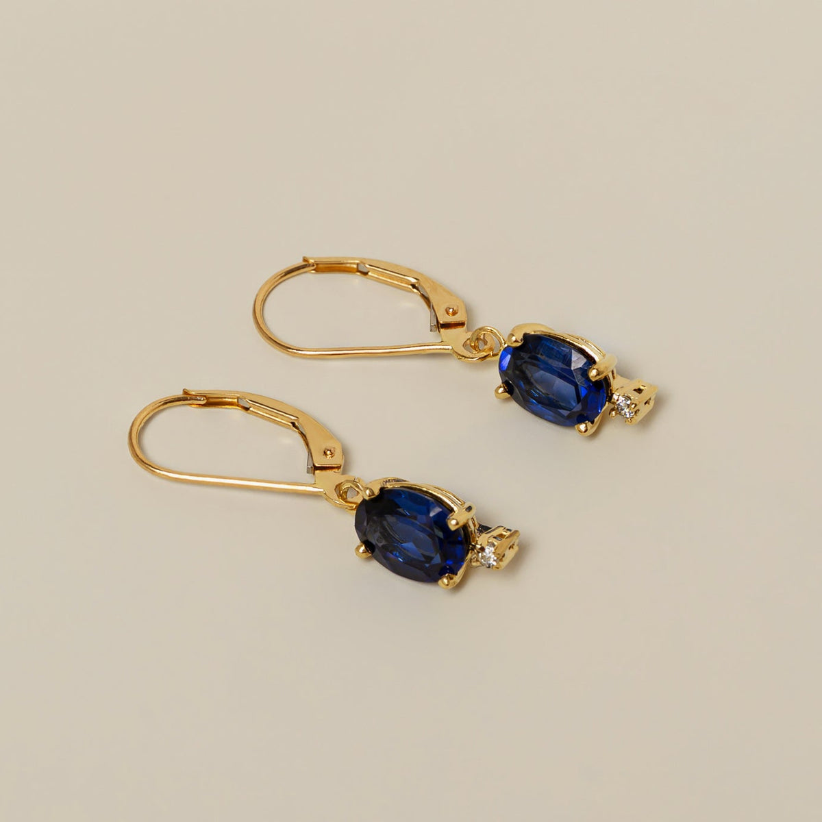 14k yellow gold lab grown oval blue sapphire leverback dangle earrings