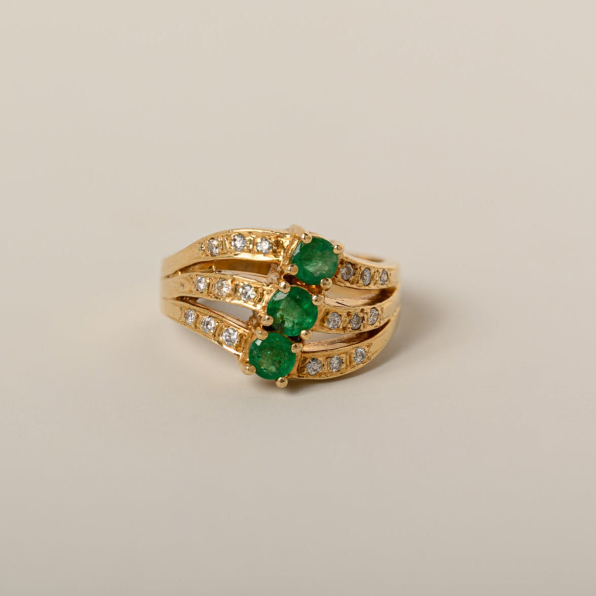 14k yellow gold wavy emerald diamond contemporary estate ring