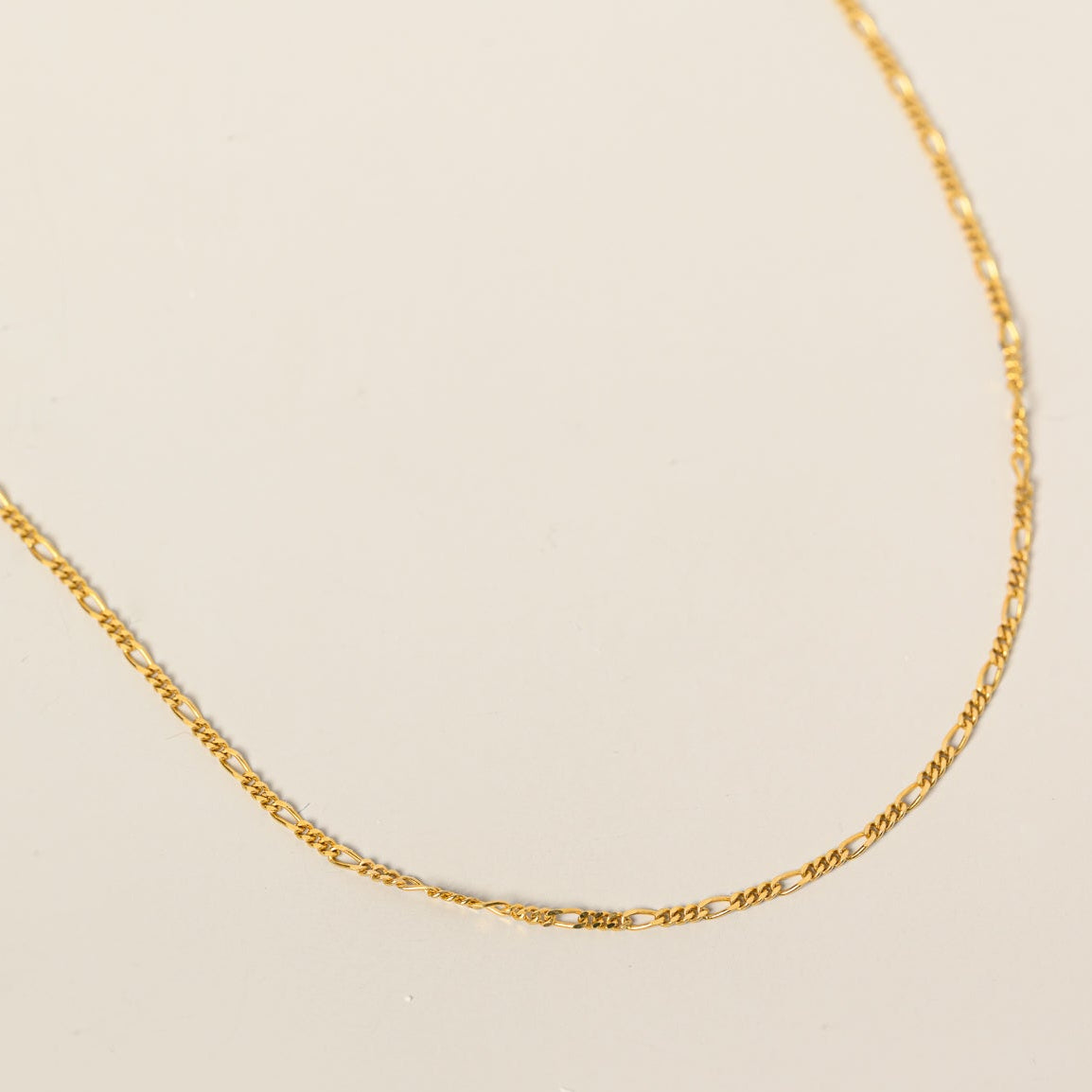 14k yellow gold dainty figaro chain bracelet