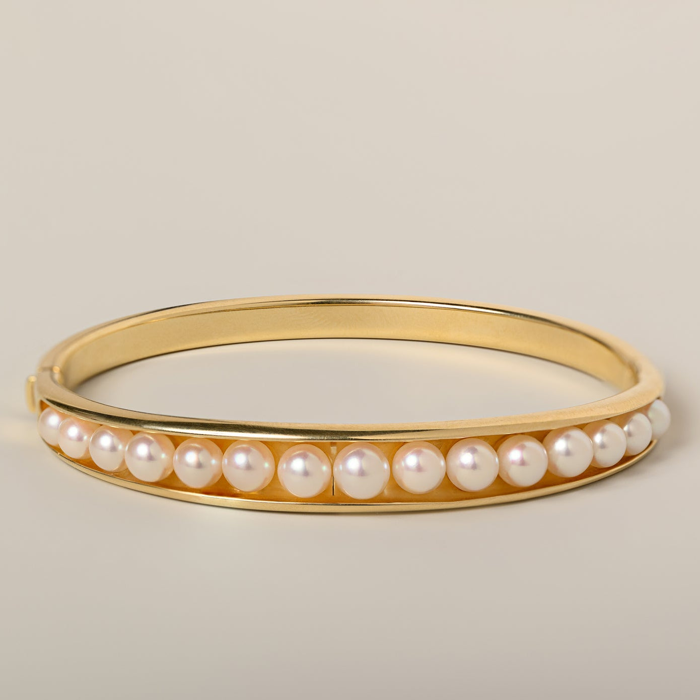 14k yellow gold graduated pearl bangle estate bracelet