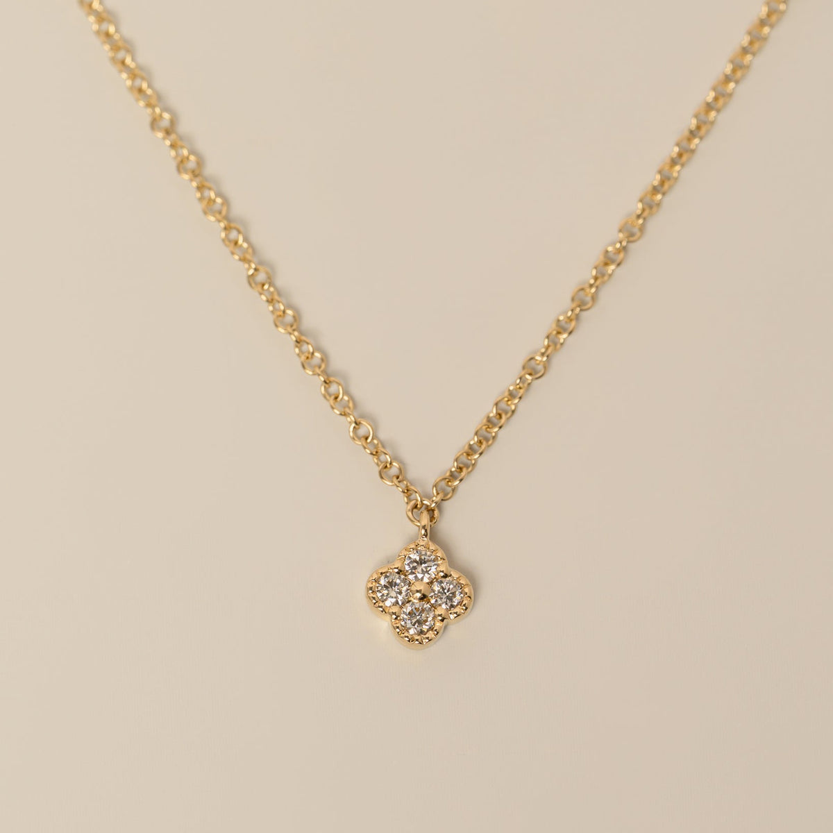 14k gold diamond quatrefoil milgrain detailing pendant necklace