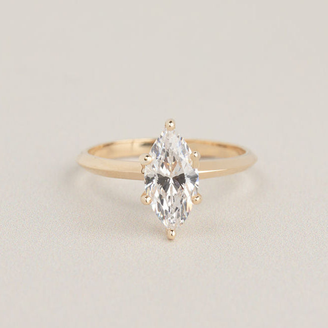 14k gold solitaire knife edge band engagement ring setting