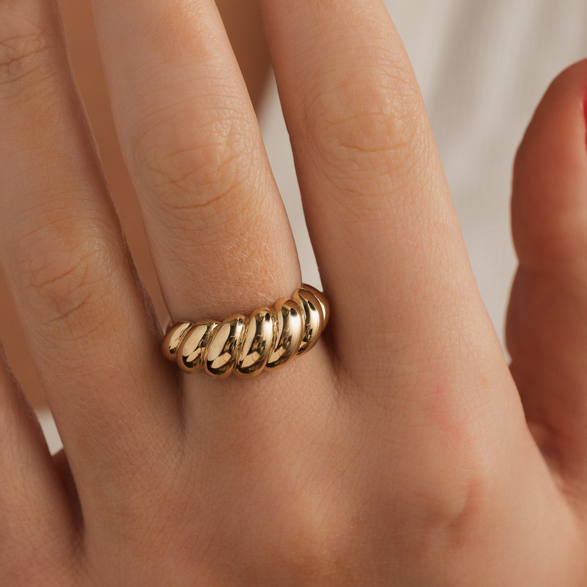 14k yellow gold polished and grooved domed shrimp ring