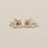 14k yellow gold emerald cut pear shape lab diamond toi et moi stud earrings