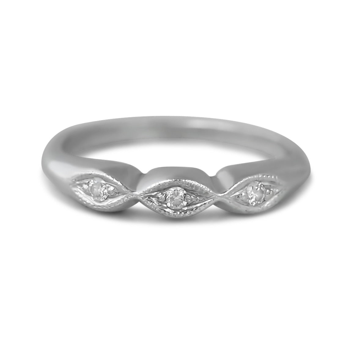 PLatinum estate wedding band with milgrain details and three dainty diamonds under 1000