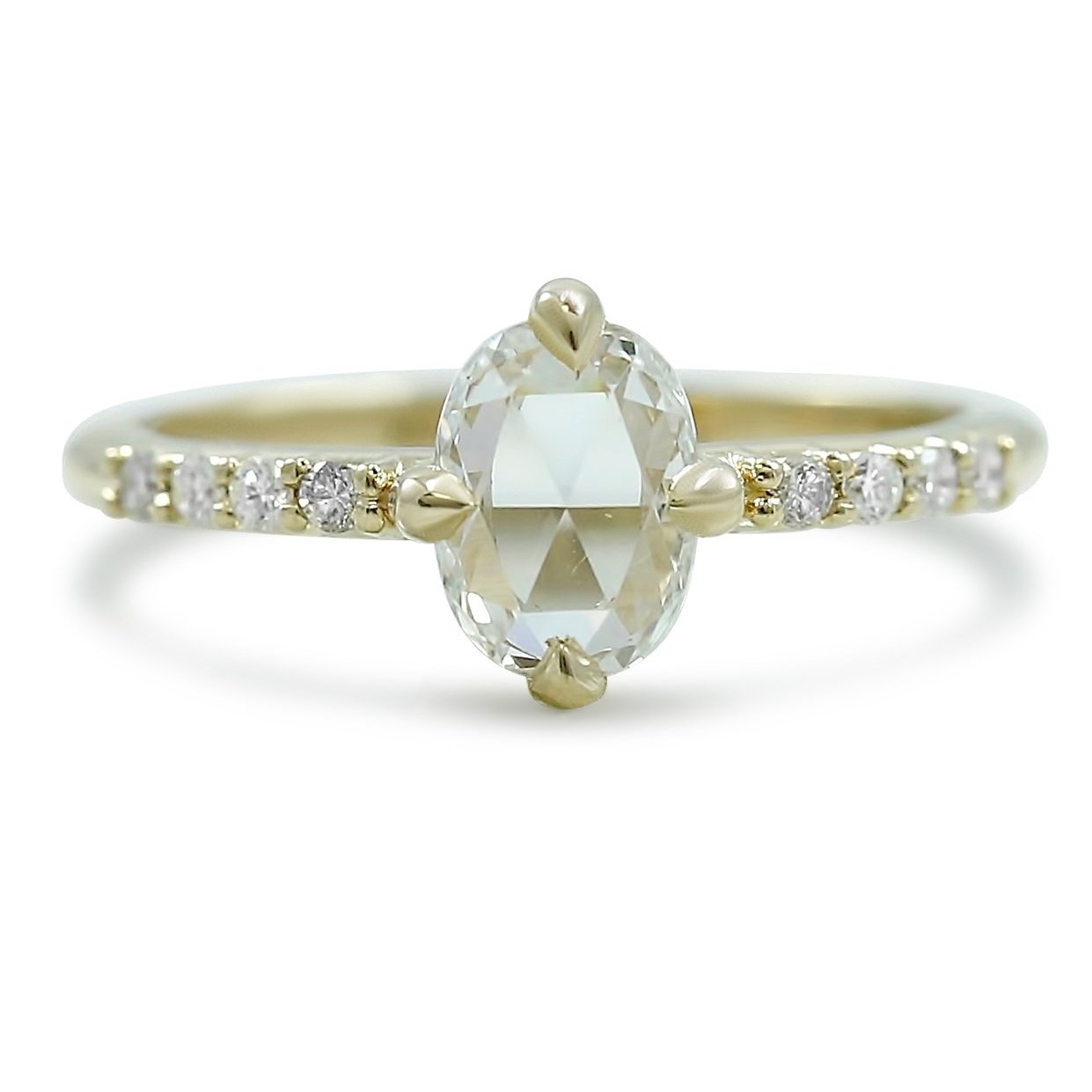 oval rose cut diamond engagement ring north south east west set with yellow gold band