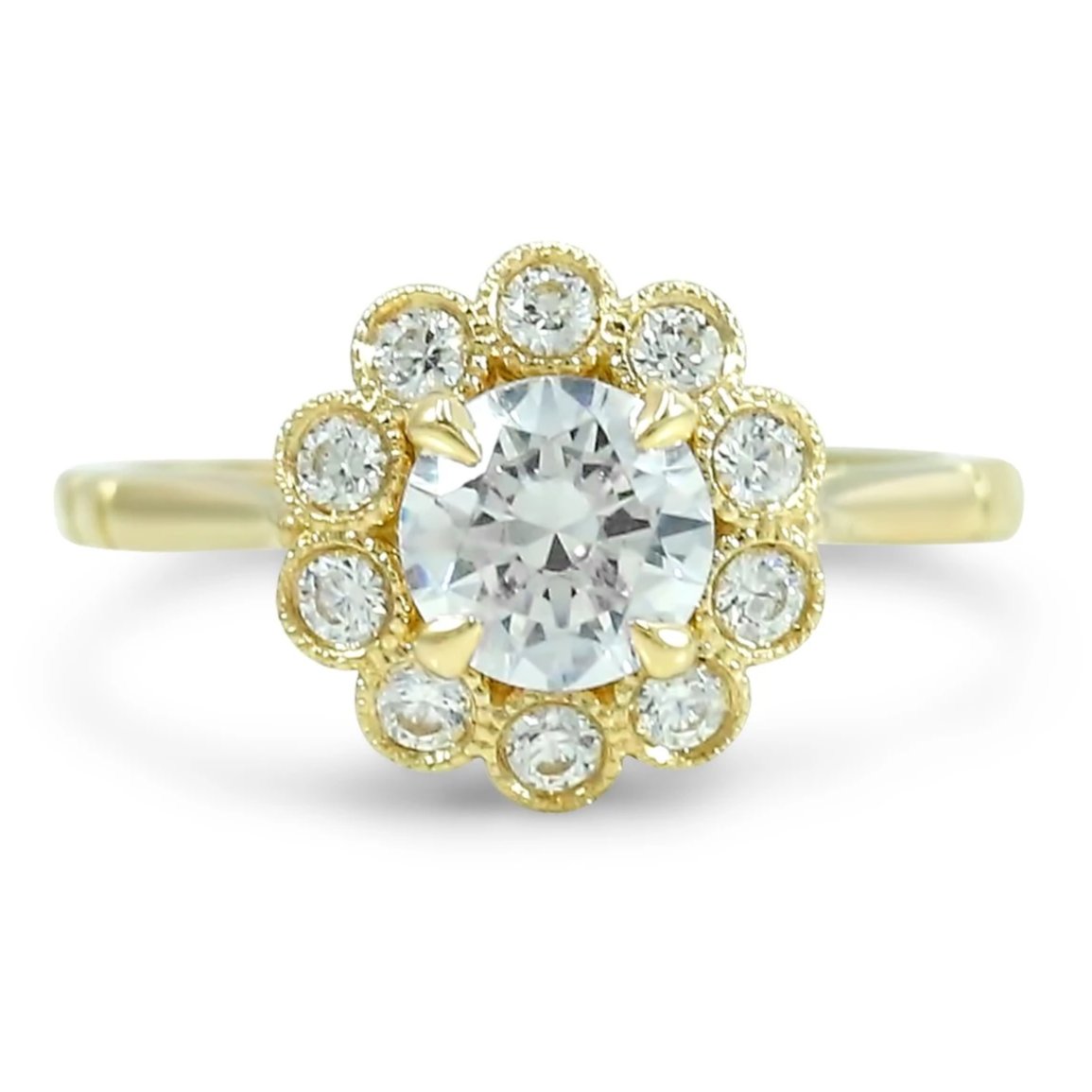 ready to ship diamond engagement ring with bezel set milgrain flower halo cathedral setting available with a round or oval diamond various metals available perfect nontraditional engagement ring