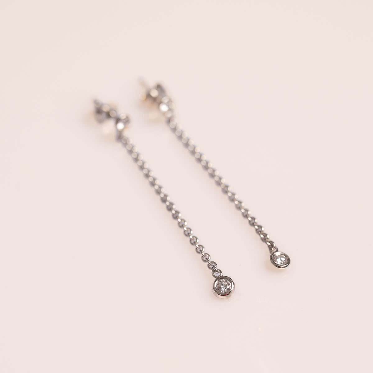14k white gold 0.50tcw diamond bezel set drop earrings modern vintage