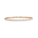 14k yellow gold staggered bezel set mixed shaped diamond bangle bracelet