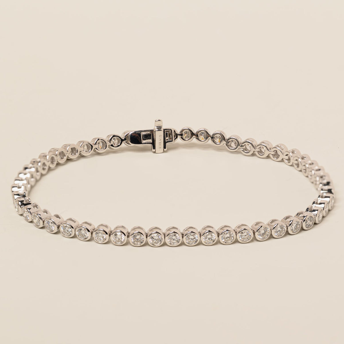 14k gold lab diamond round brilliant cut bezel set tennis bracelet