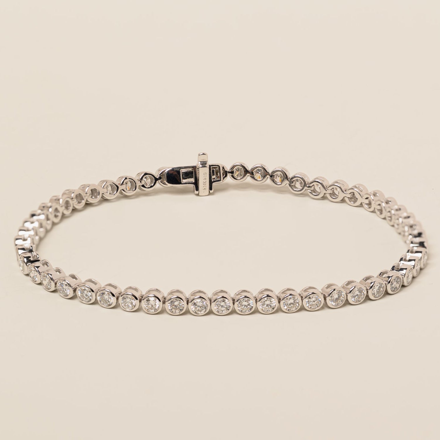 14k gold lab diamond round brilliant cut bezel set tennis bracelet