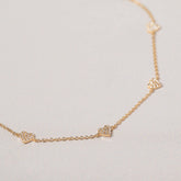 14k yellow gold diamond pave heart station bracelet