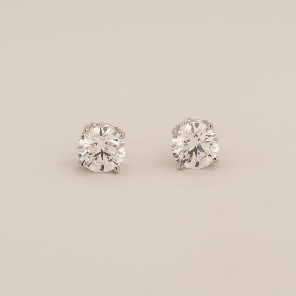 14k gold round brilliant cut lab grown diamond four prong stud earrings