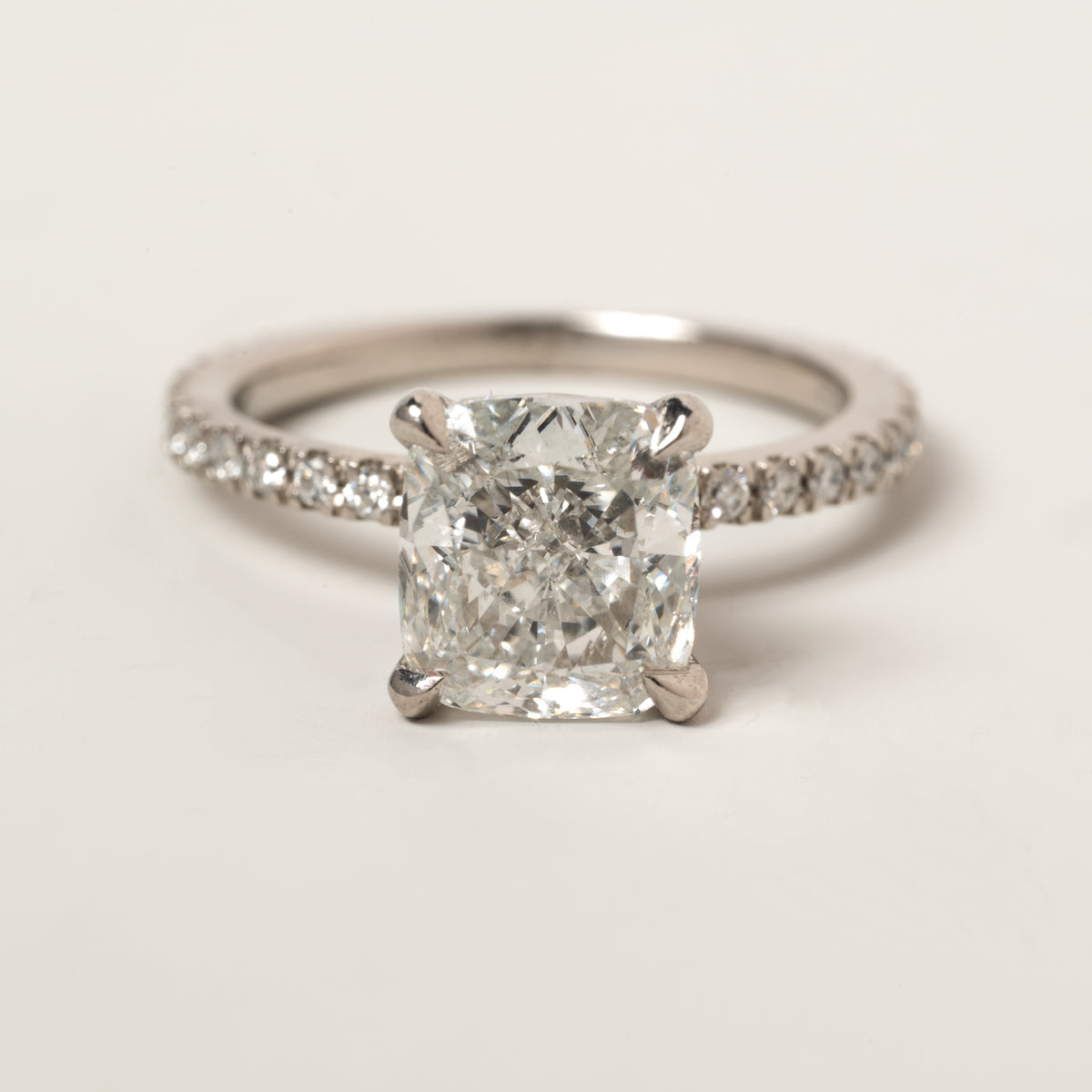 platinum 2.16ct cushion cut lab grown diamond hidden halo diamond pave band engagement ring