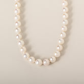 18" strand of freshwater pearl necklace with 14k yellow gold fishhook clasp