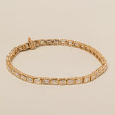 14k gold east west lab diamond emerald cut bezel set tennis bracelet 