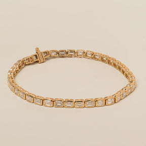 14k gold east west lab diamond emerald cut bezel set tennis bracelet 