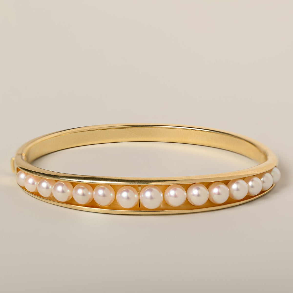 14k yellow gold graduated pearl bangle estate bracelet