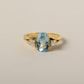 18k yellow gold oval aquamarine diamond side stone contemporary estate ring