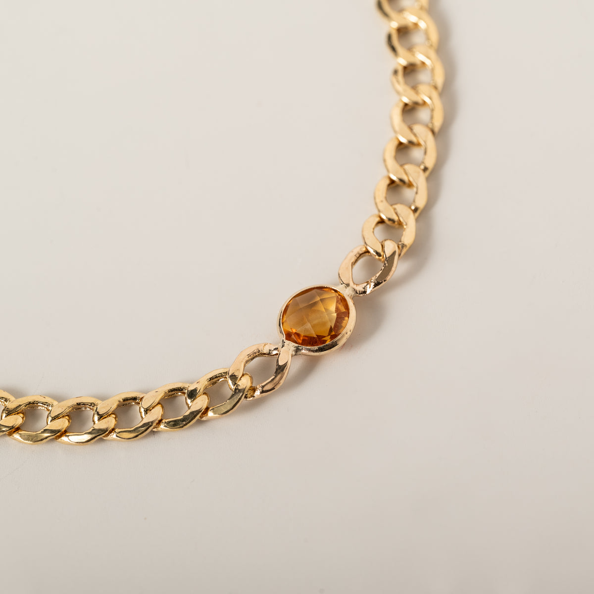 14k yellow gold curb chain bezel set round citrine bracelet
