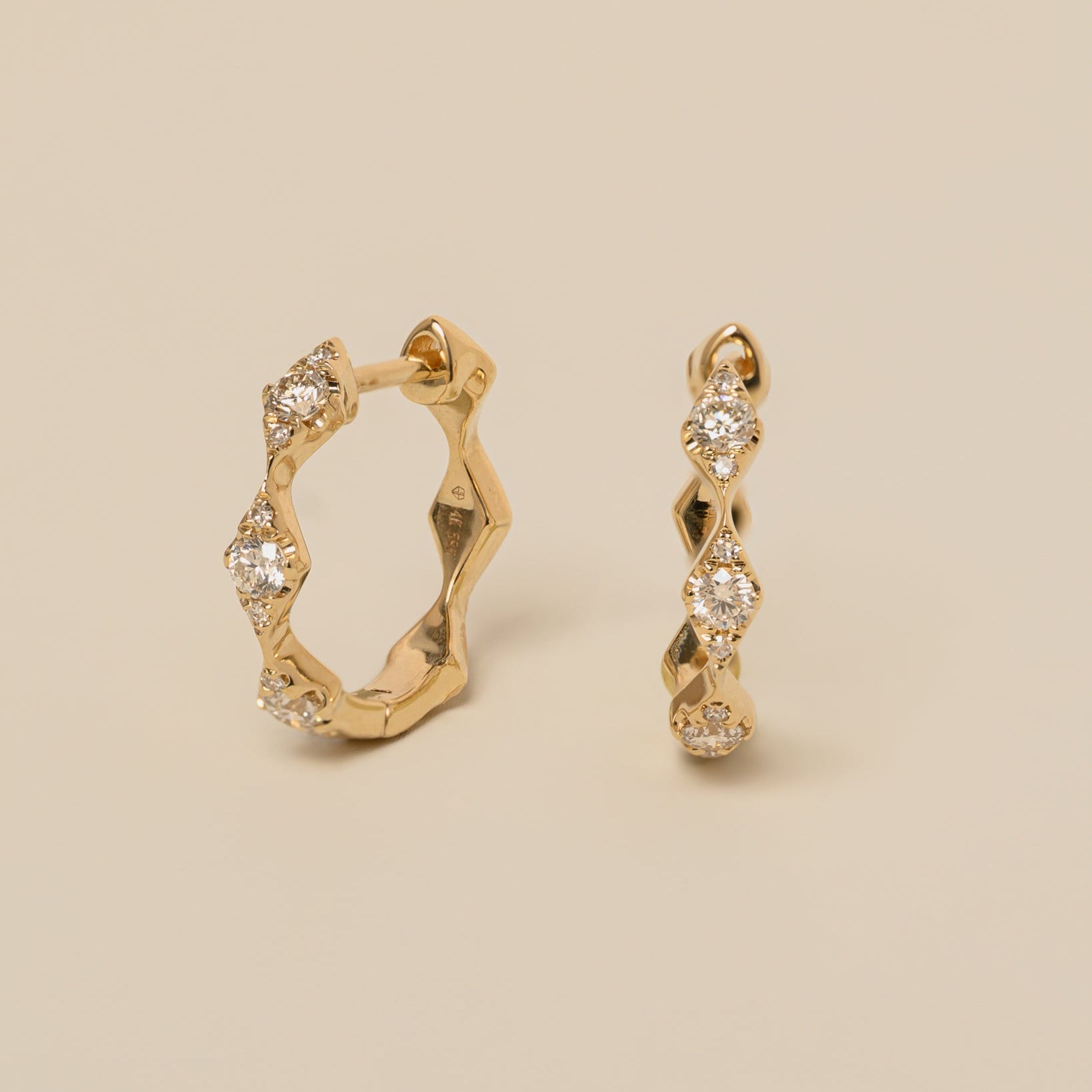 14k gold diamonds on diamond huggie hoop earrings