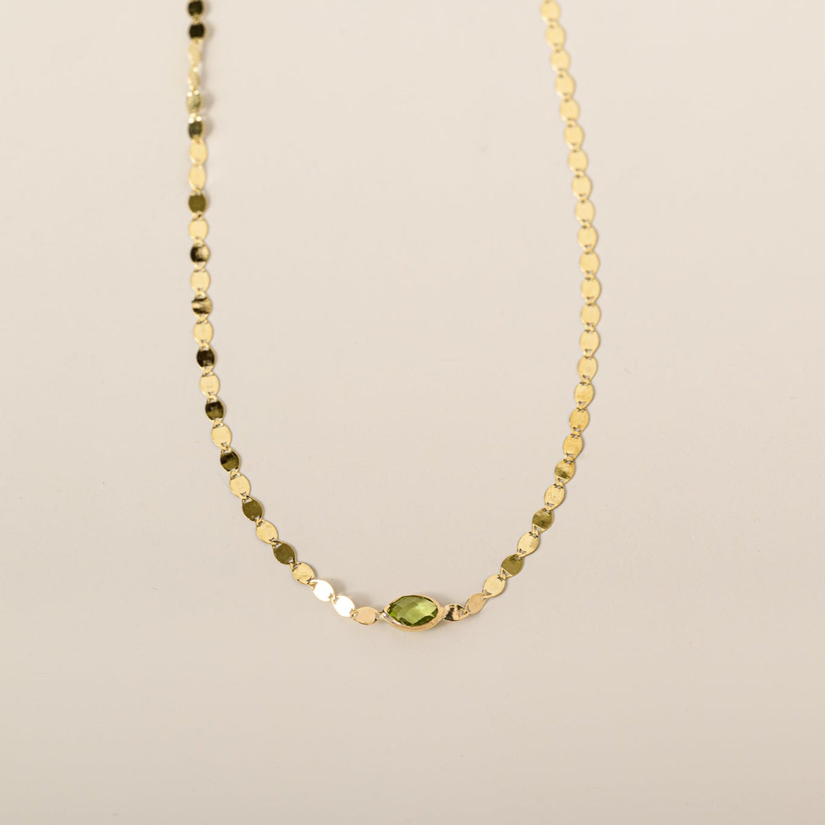 14k yellow gold bezel set east west oval peridot mirror chain necklace