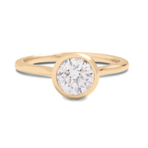 round brilliant cut lab grown diamond bezel set 14k solitaire engagement ring