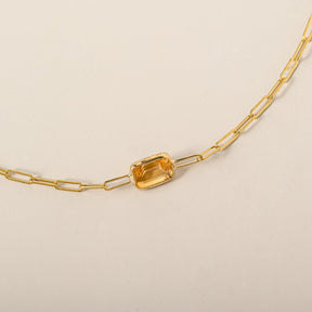 14k yellow gold emerald cut east west bezel set citrine paperclip chain bracelet