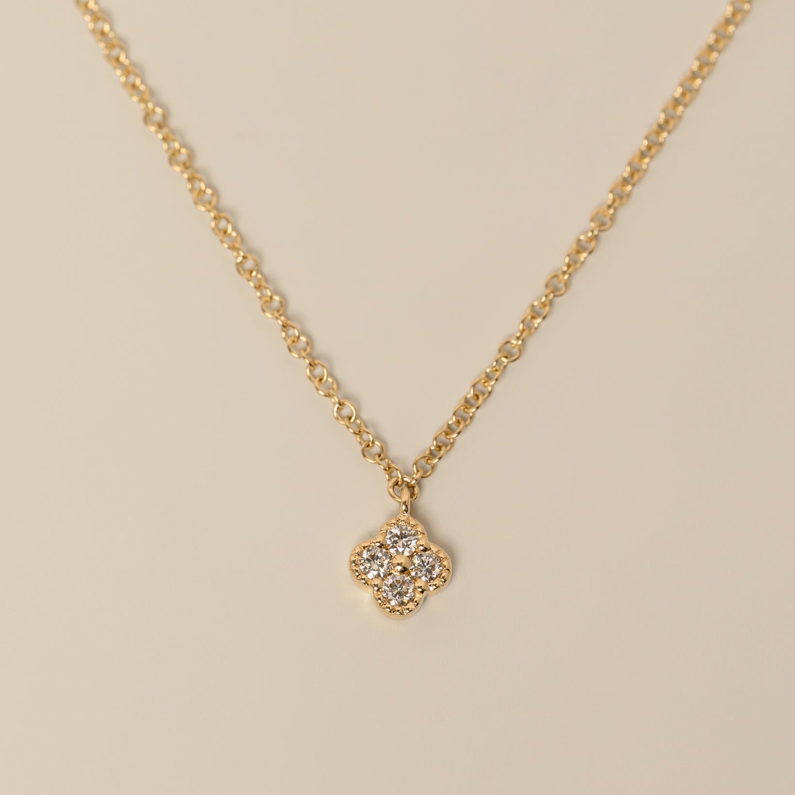 14k gold diamond quatrefoil milgrain detailing pendant necklace 