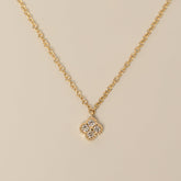 14k gold diamond quatrefoil milgrain detailing pendant necklace 
