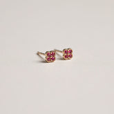 14ky gemstone flower studs with milgrain detail