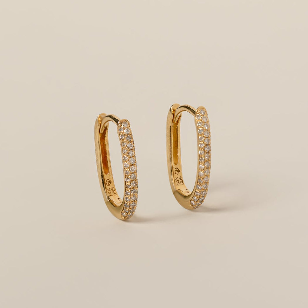 14k gold diamond pave elongated oval small hoop earrings