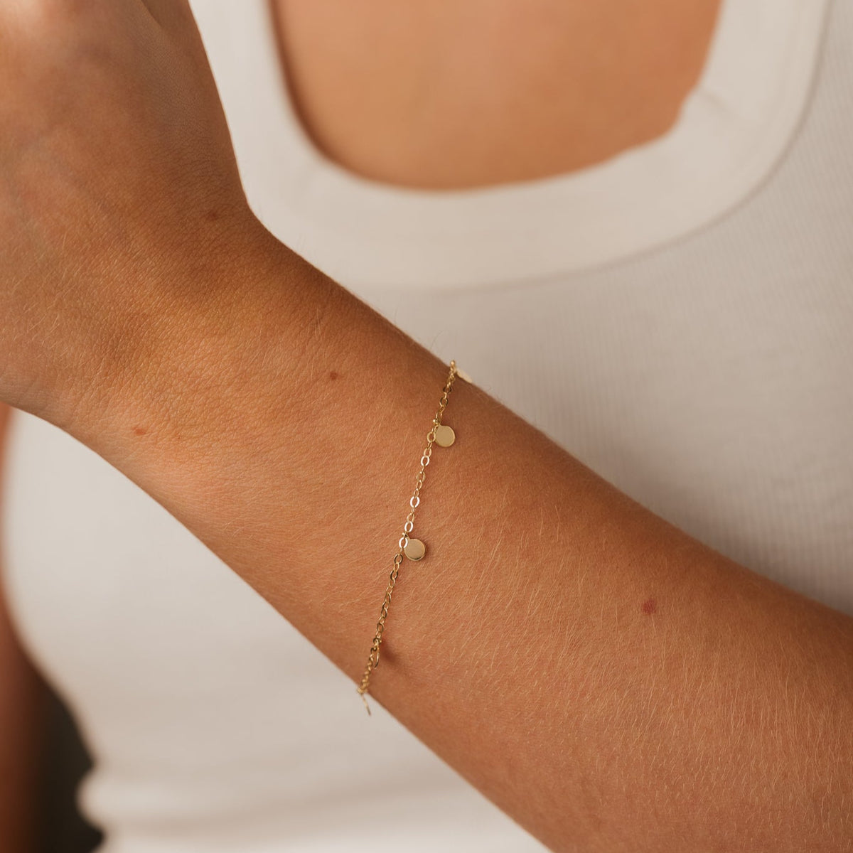 14k yellow gold polished dangle circle disc station bracelet