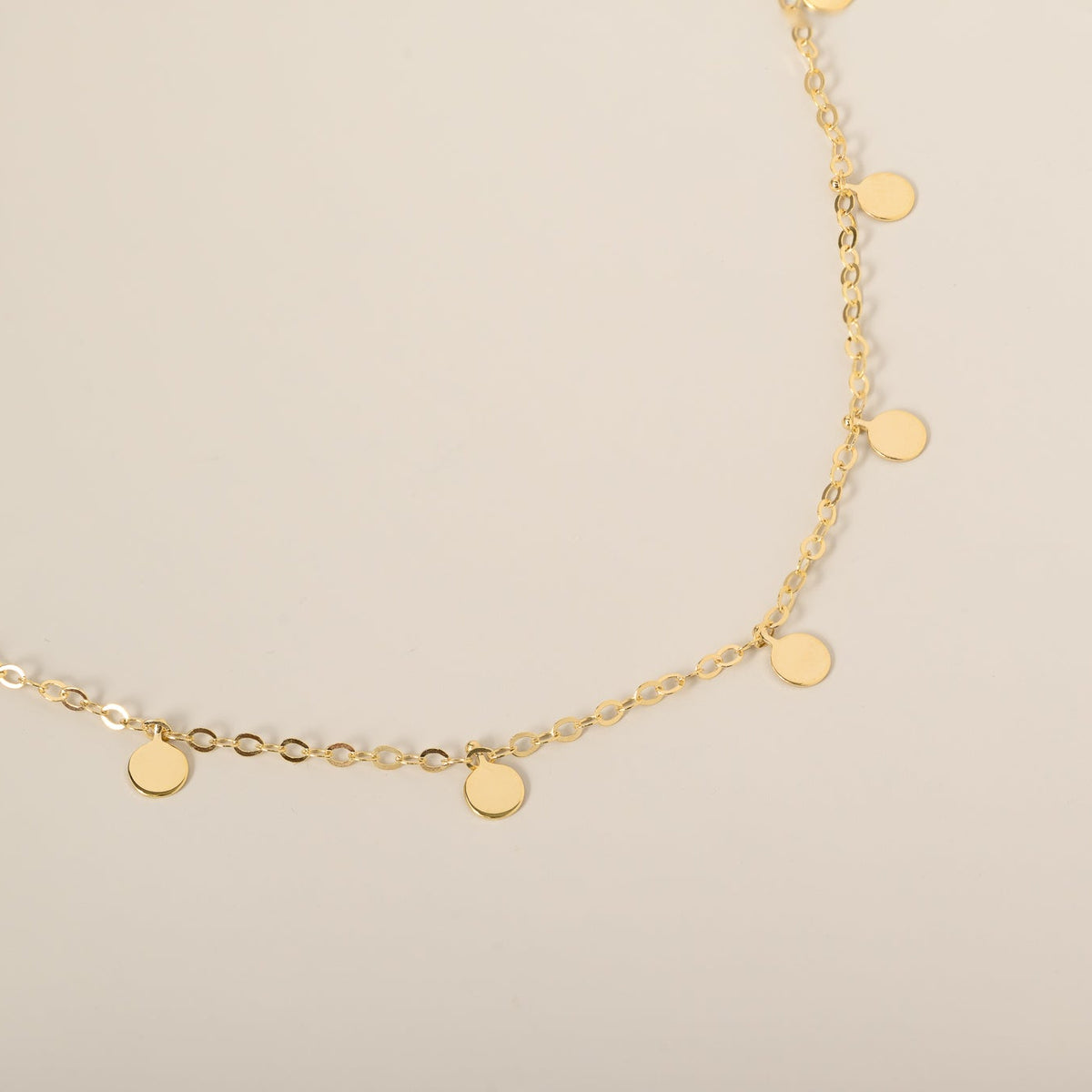 14k yellow gold polished dangle circle disc station bracelet
