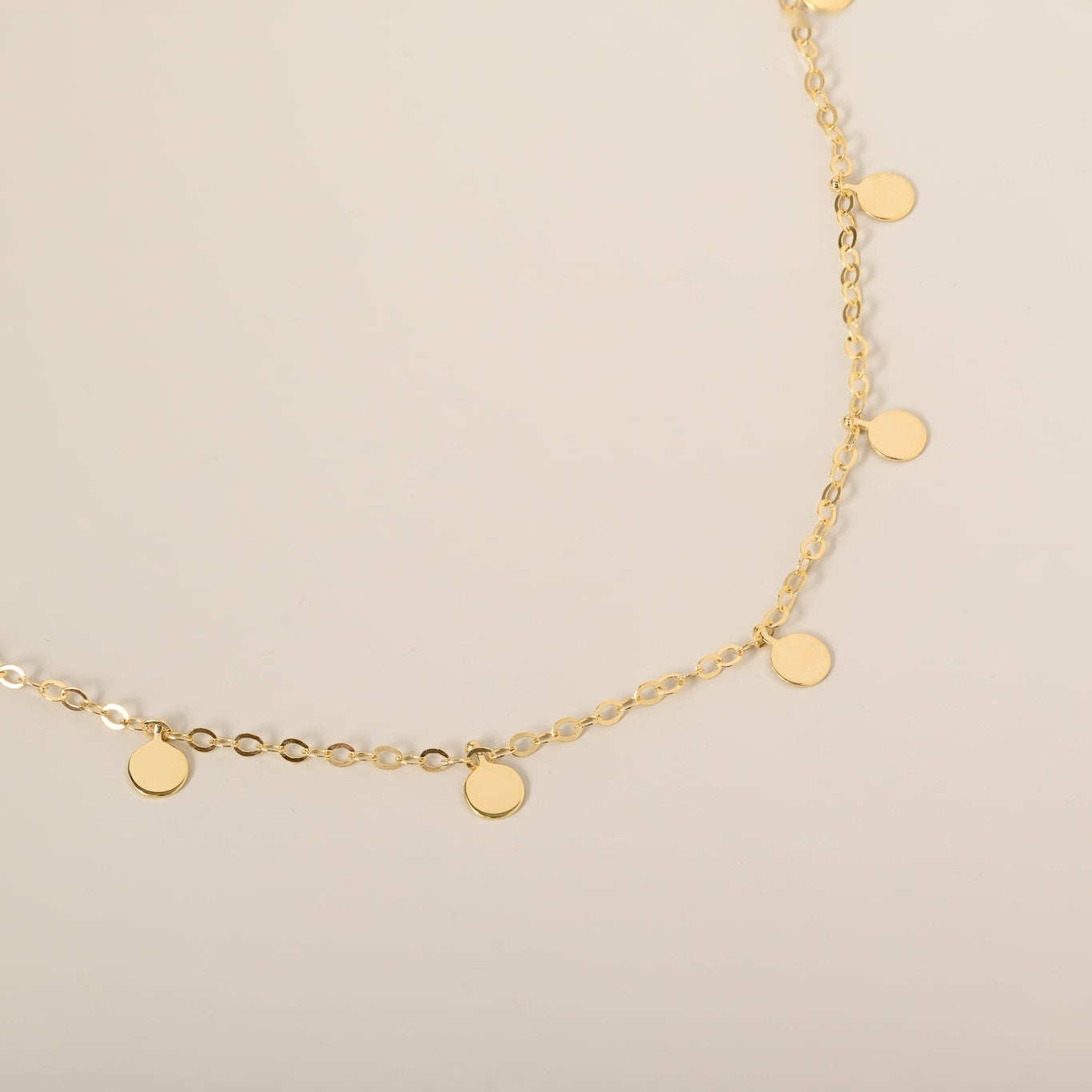 14k yellow gold polished dangle circle disc station bracelet