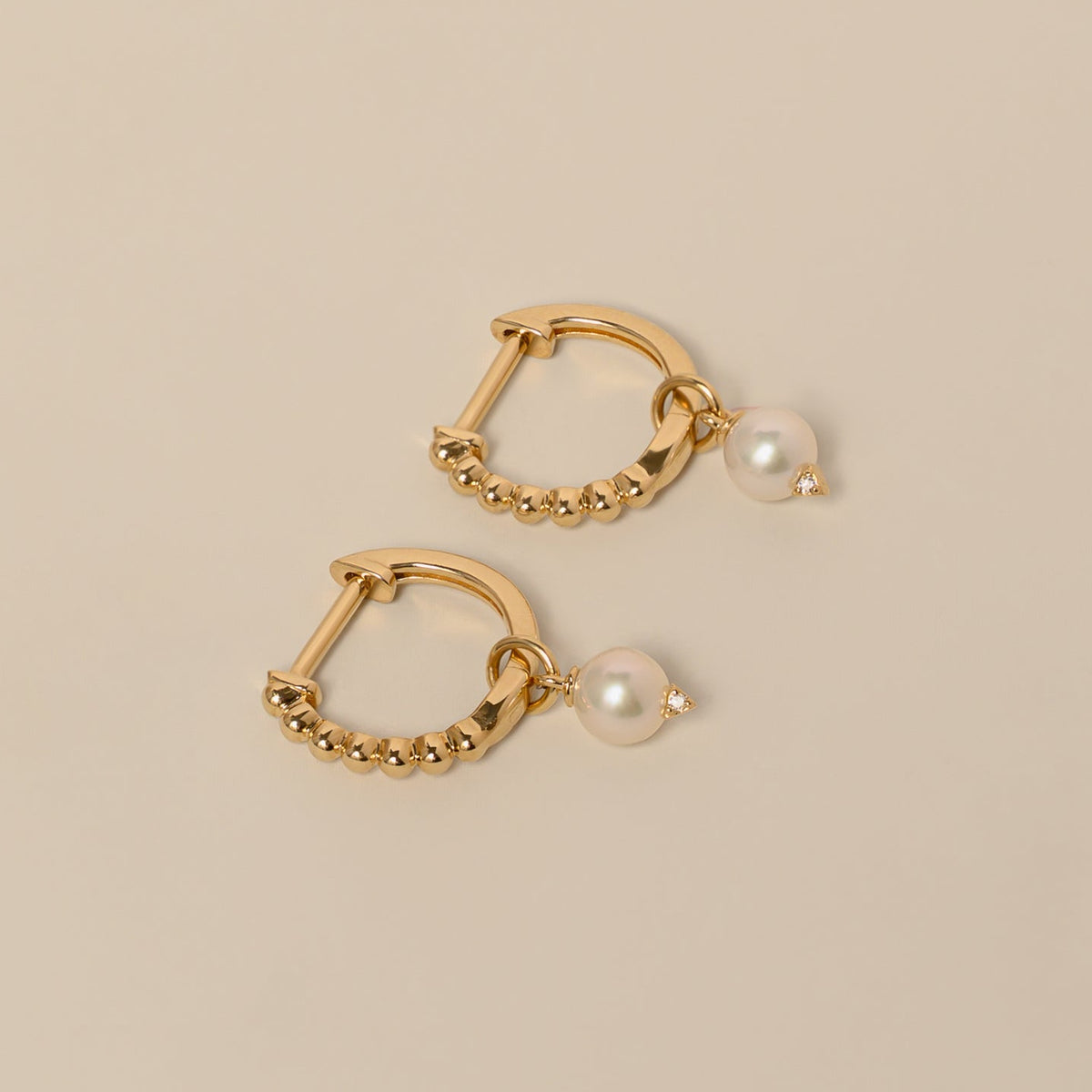 14k yellow gold beaded huggie hoops with pearl dangle earrings