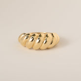 14k yellow gold polished and grooved domed shrimp ring