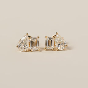 14k yellow gold emerald cut pear shape lab diamond toi et moi stud earrings
