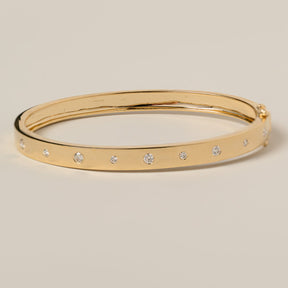 14k gold flush set round cut diamond bangle bracelet