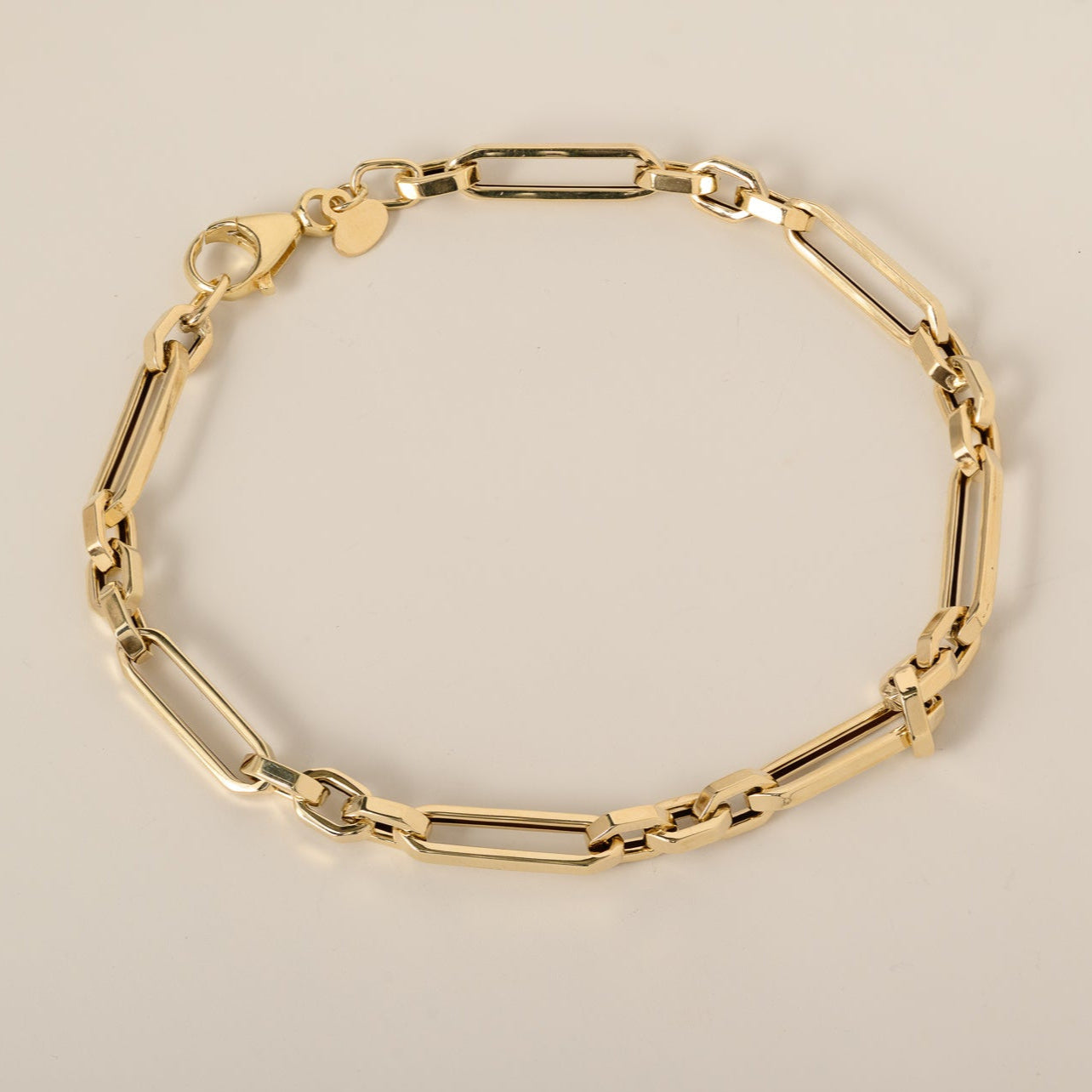 14k yellow gold polished flat edge mixed oval link bracelet 7.5"