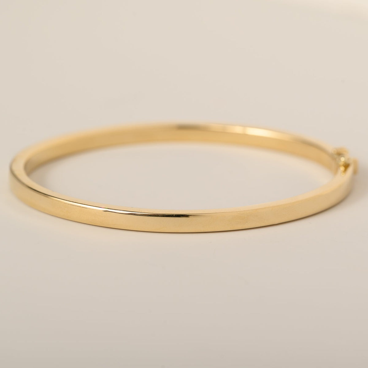 14k gold flat 4mm plain bangle with hinge 