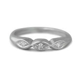 PLatinum estate wedding band with milgrain details and three dainty diamonds under 1000