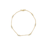 14k gold bezel set diamond station bracelet 