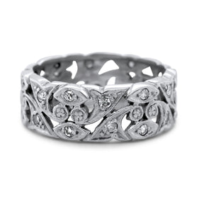Platinum chunky estate band with rose cut diamonds and an engraved flower pattern