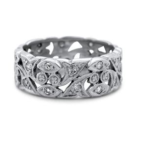 Platinum chunky estate band with rose cut diamonds and an engraved flower pattern