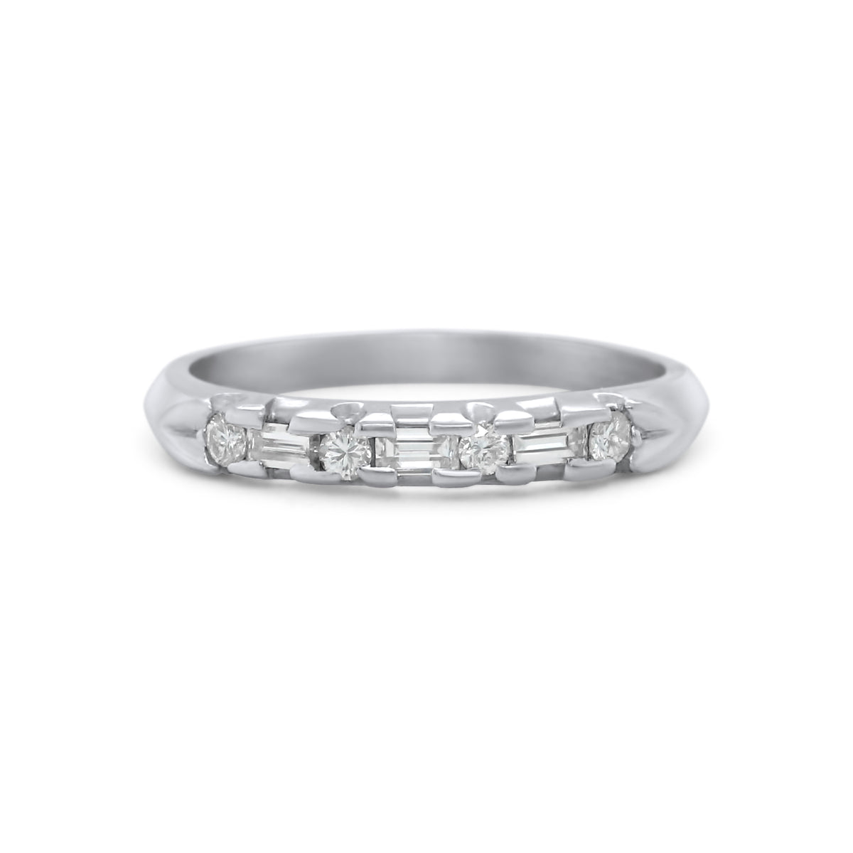 Platinum round and baguette cut diamond estate wedding band