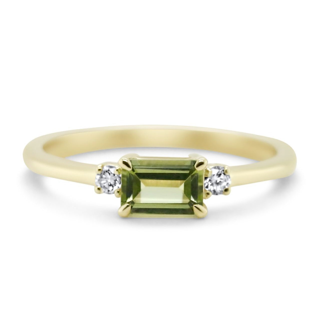 14k yellow gold three stone ring with 0.76ct emerald cut peridot and round cut diamonds