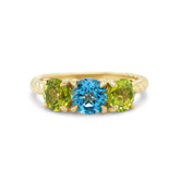 14k yellow gold rope band three stone gemstone ring blue topaz peridot