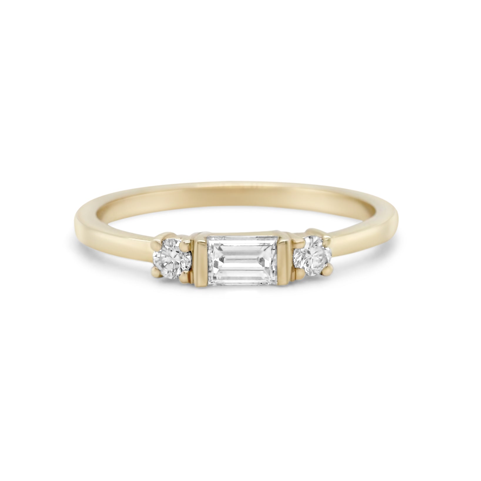 14k yellow gold diamond baguette center stone with round cut side stones